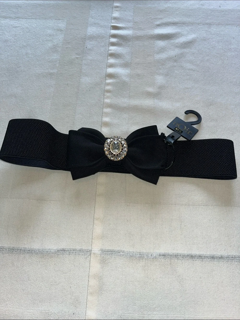 NWT nOir Jewelry Black Bow Elastic Waist Belt with Crystal Medallion Size M/L